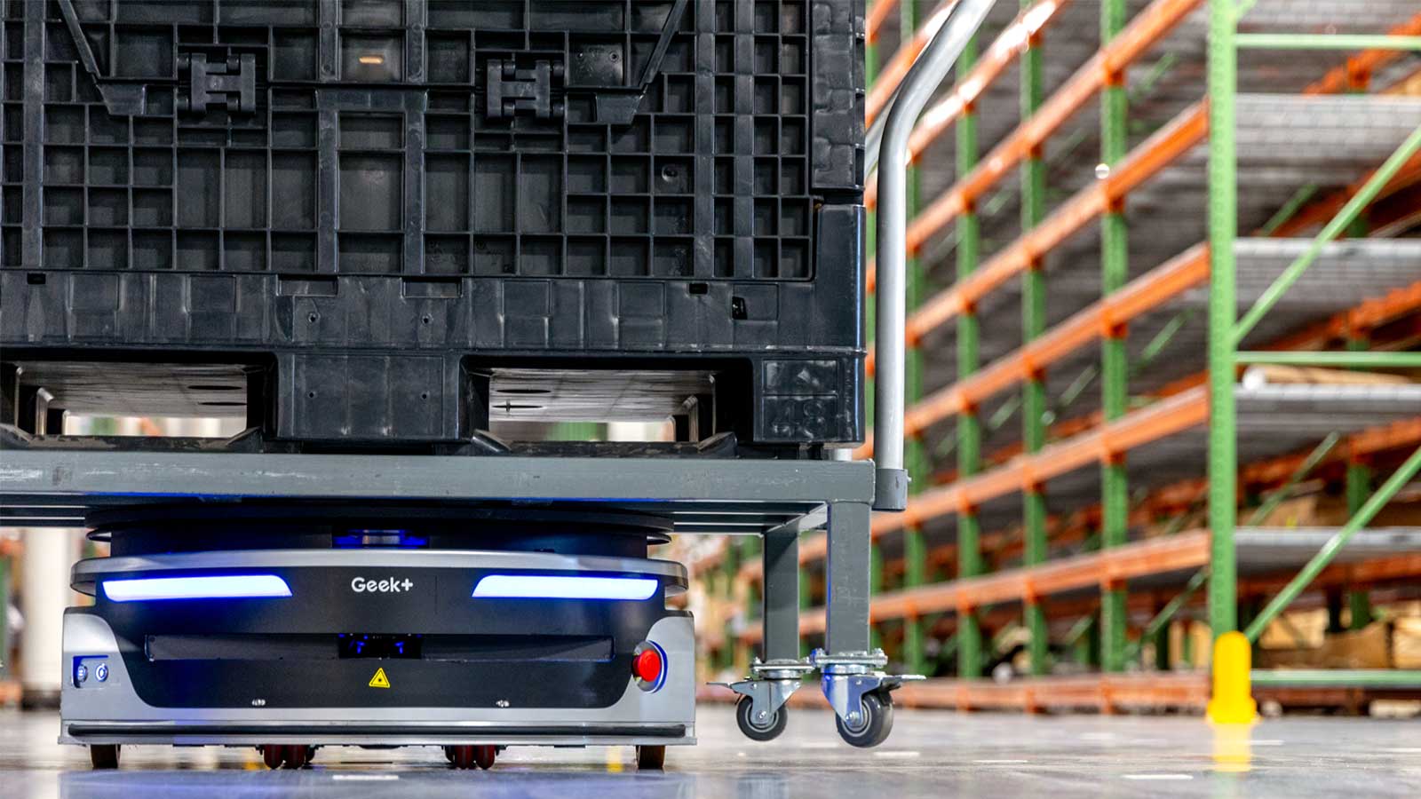 Autonomous Mobile Robot (AMR) transporting inventory in distribution center