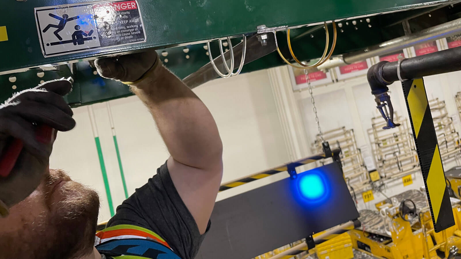 KPI LTS Technician Working Overhead on Equipment.jpg