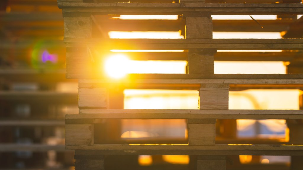 Sun Through Pallets at Warehouse